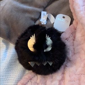 Aldo fluffy black monster pom pom keychain